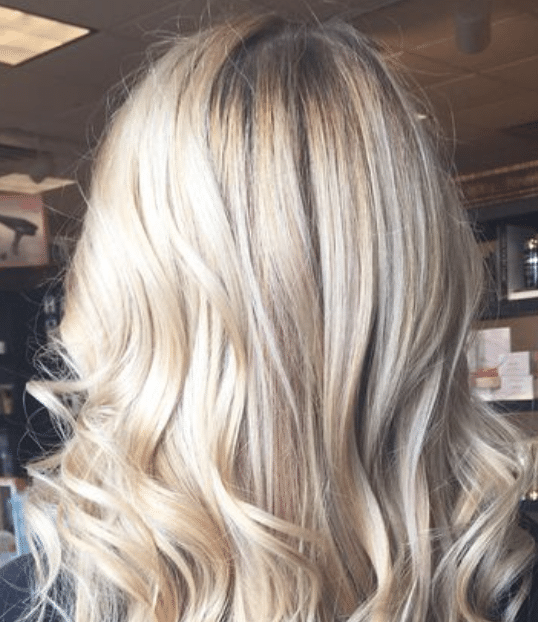 Picture a woman's hair behind before curls